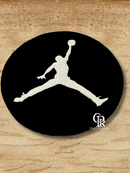 Black athlete silhouette round hand-tufted rug with bold sports-inspired design, perfect for gyms, kids rooms, or studios