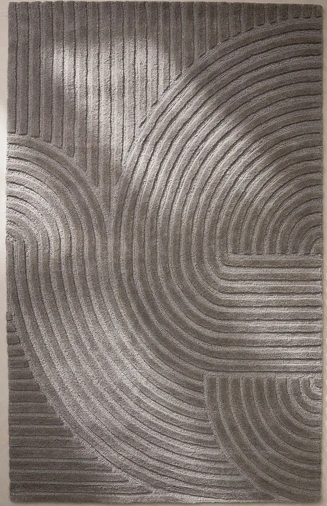 Arden Taupe hand tufted wool rug featuring curved arc pattern with textured surface and modern taupe color.