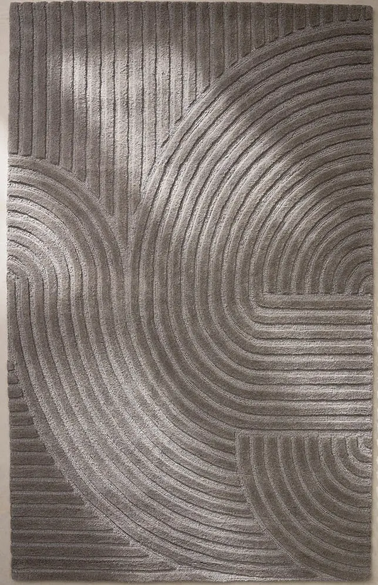 Arden Taupe hand tufted wool rug featuring curved arc pattern with textured surface and modern taupe color.