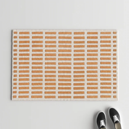 Top view of Gridline Terra Wool Rug hand tufted wool rug with structured grid design.