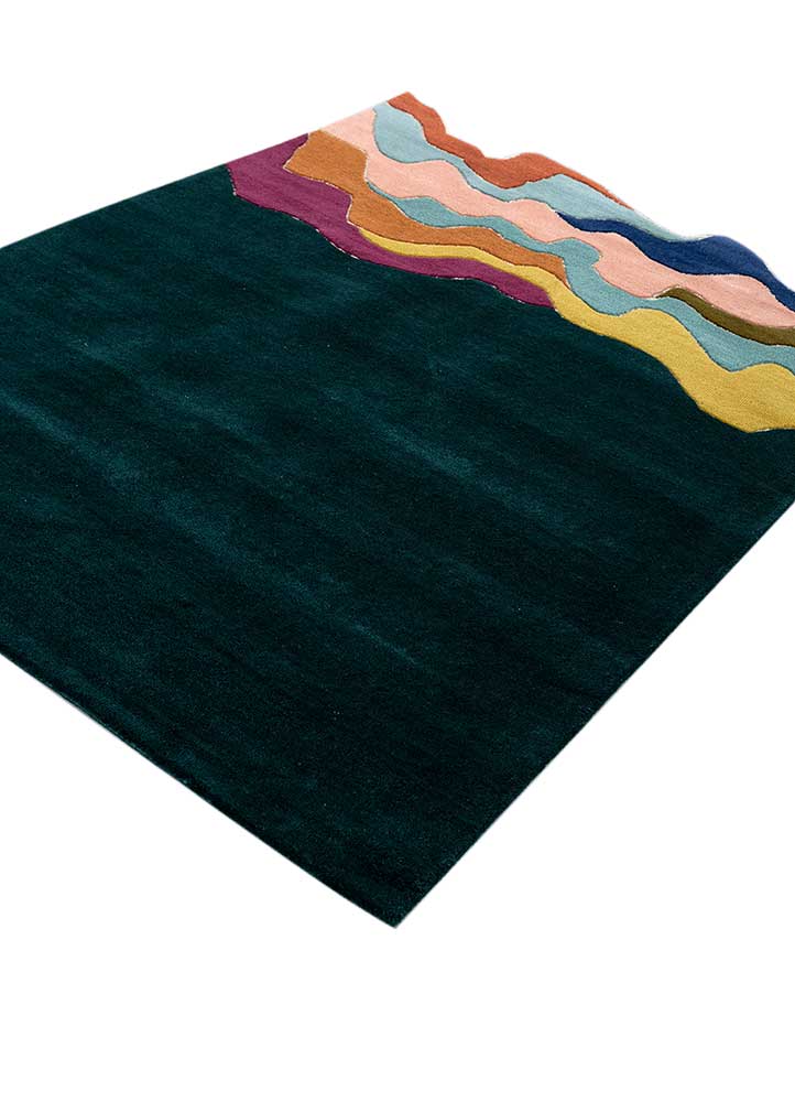 Abstract layered wave hand tufted wool rug shown from angled view highlighting flowing design and color layers.