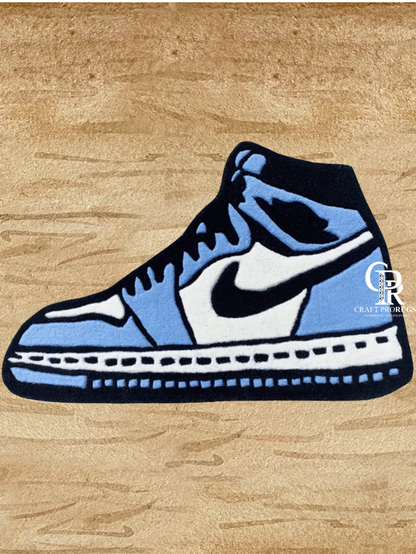 Front view of Air Jordan Blue Hand-Tufted Rug showcasing a classic blue and white sneaker artwork on a premium tufted base.