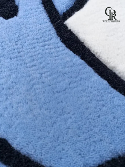 Macro view of Air Jordan Blue Hand-Tufted Rug emphasizing plush texture and clean color definition.