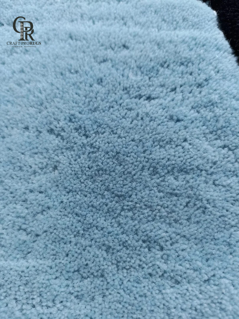 Detailed texture view of Air Jordan Hand-Tufted Rug showing dense pile and soft premium wool craftsmanship.