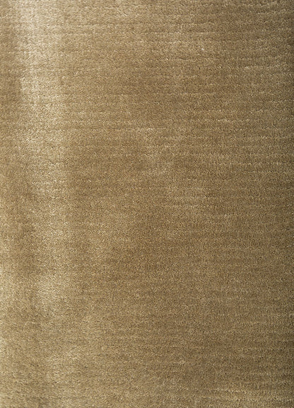 Hand-tufted beige wool rug texture, soft wool pile, neutral elegant wool design close-up.
