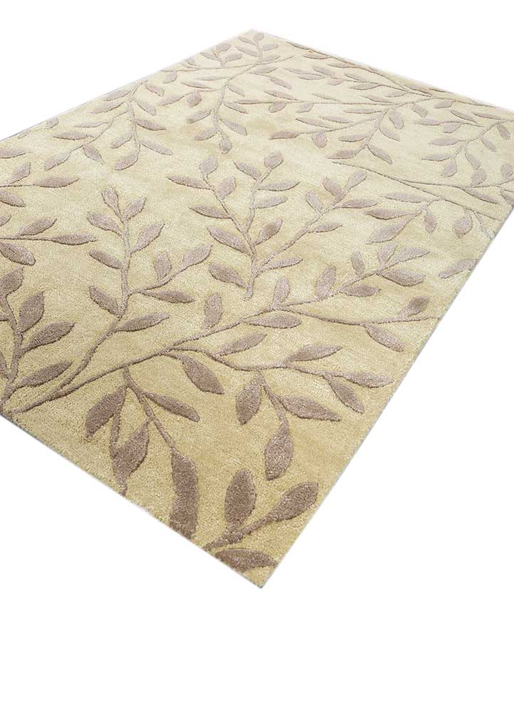 Side angle view of Botanical Leaf hand tufted wool rug showing thickness and edge detailing