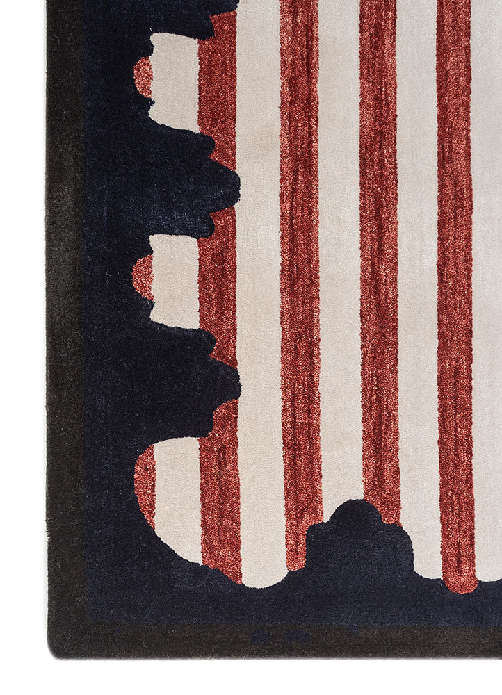 Border detail of Crimson Rhythm Striped hand tufted wool rug with contrasting dark edges and crisp vertical stripe design.