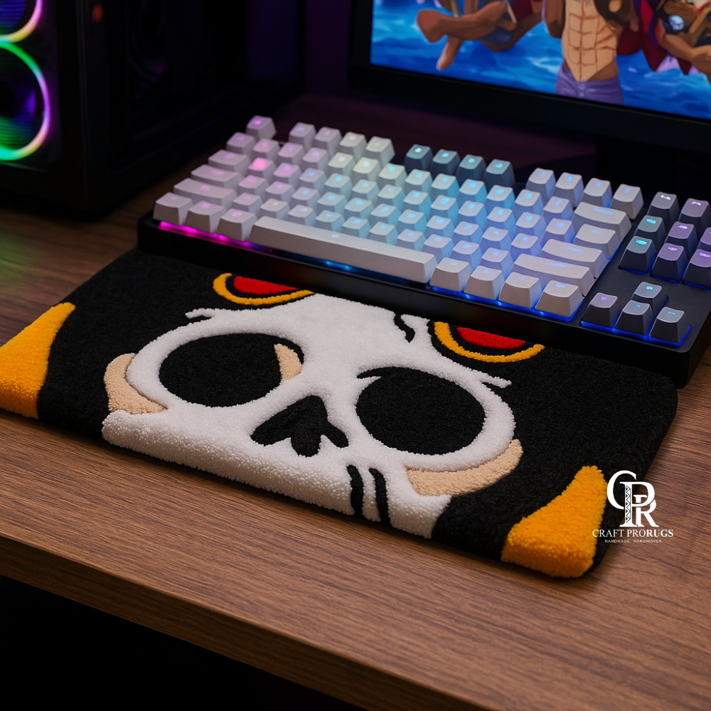 Full view of Dark Skull Hand‑Tufted Keyboard Mat on desk, showing complete skull design and size