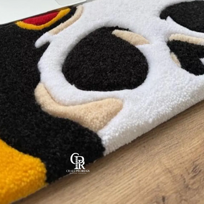 Close-up of soft hand-tufted yarn and detailed skull design on dark skull keyboard desk mat