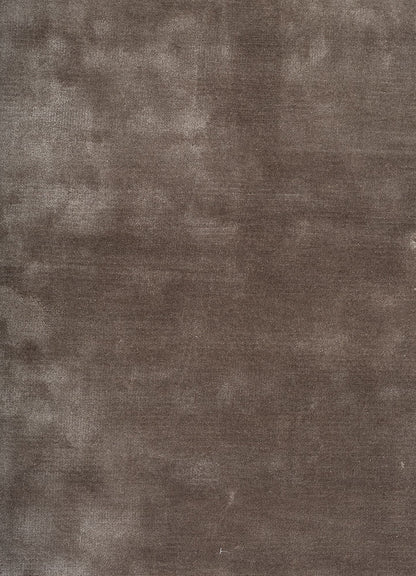 Close-up of Earthy Tone Taupe Hand-Tufted Wool Rug showing soft tactile texture and tonal variations.