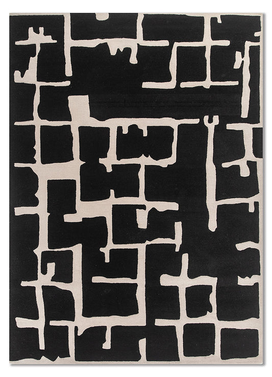 Full view of Linear Grid Black and Ivory hand tufted wool rug featuring bold geometric grid pattern with modern contrast.