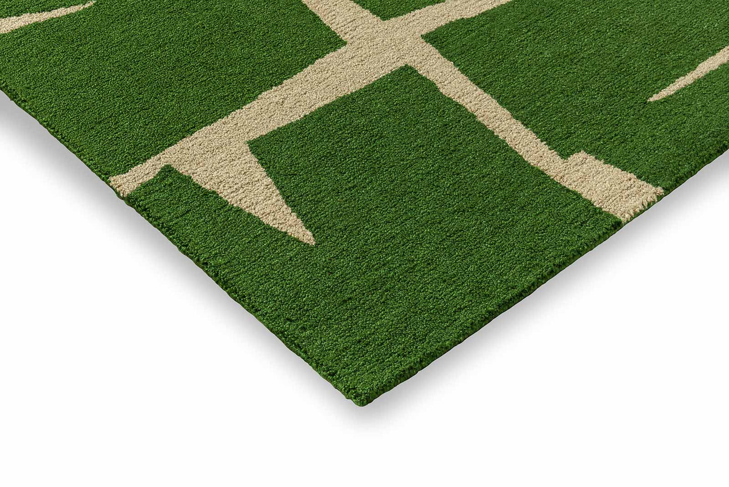 Corner detail of Moqui Green hand tufted wool rug highlighting clean edges thickness and premium wool construction.