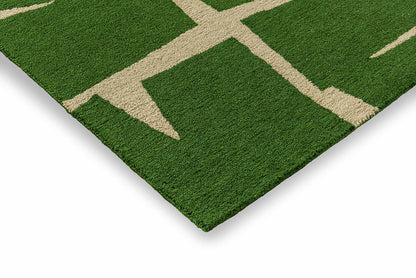 Corner detail of Moqui Green hand tufted wool rug highlighting clean edges thickness and premium wool construction.