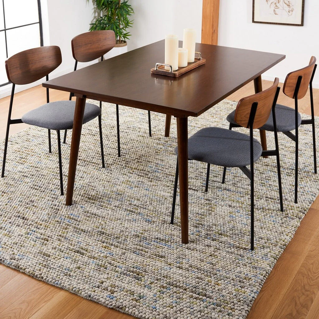 Pebbles Multi Ivory flatweave rug under dining table, hand-woven wool and cotton rug in modern interior setup