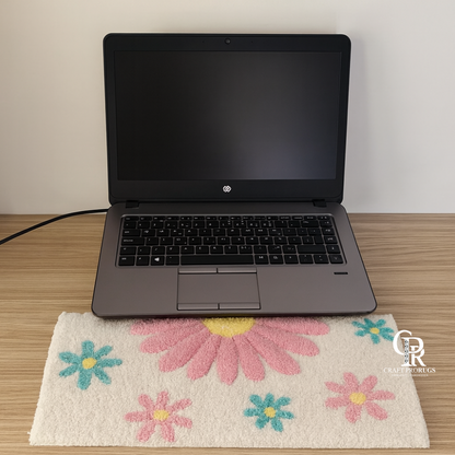 Hand‑tufted pink flower desk mat with floral design