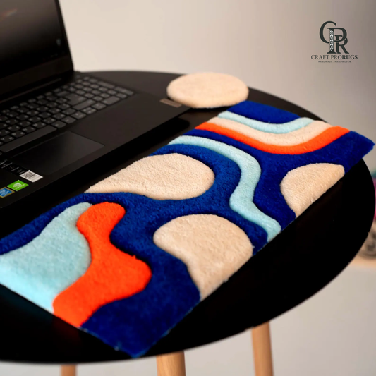 Wave Flow Desk Rug front view showing colorful abstract wave pattern placed in front of keyboard for desk setup