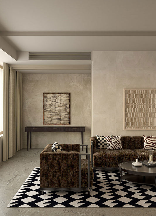 Zigzag monochrome wool rug in a modern living room with sofa and coffee table, hand-tufted design.